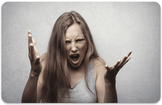 woman yelling with her hands in the air
