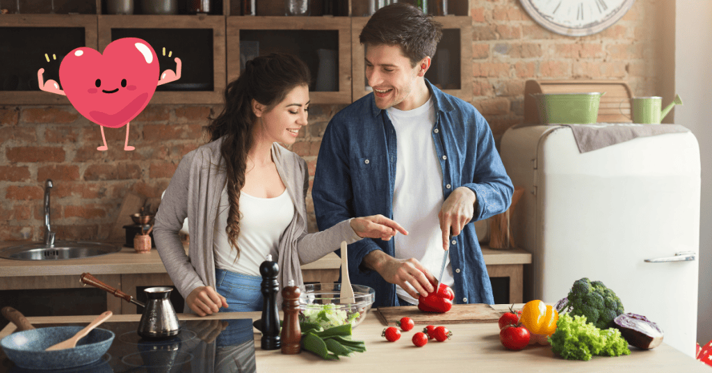 couple cooking together with heart emoji