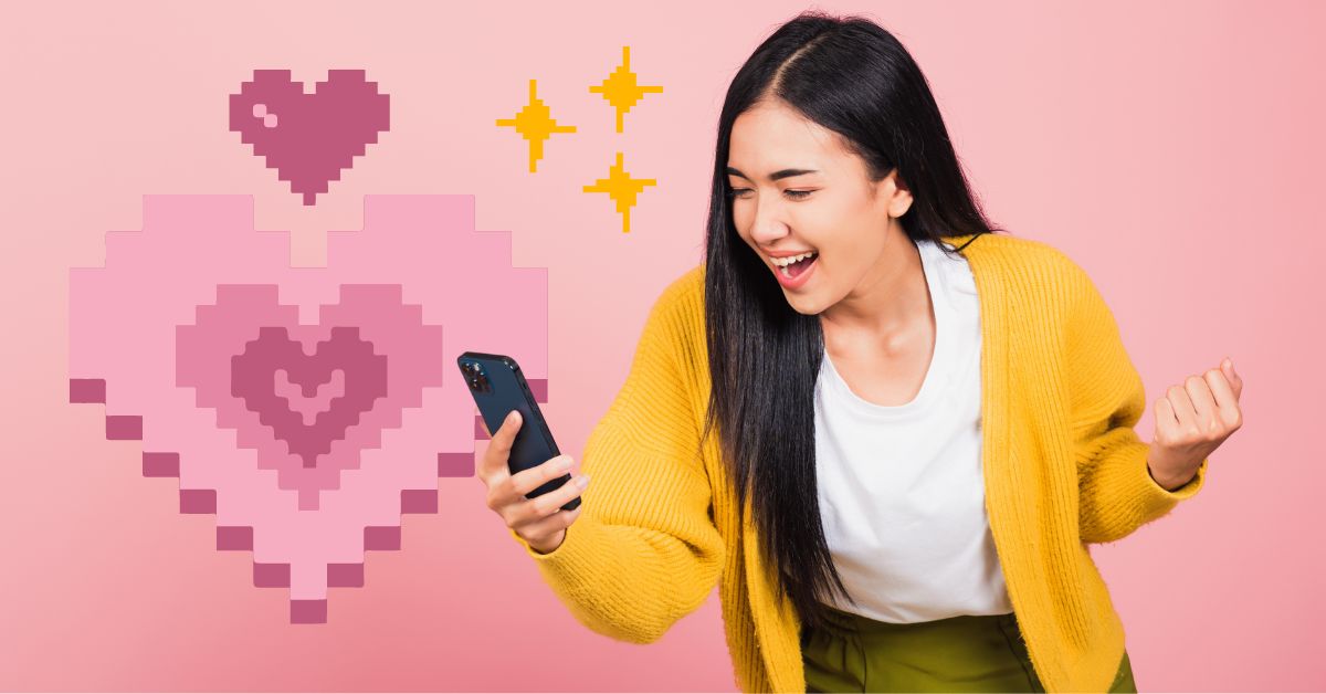 woman smiling at phone with pixel heart icon