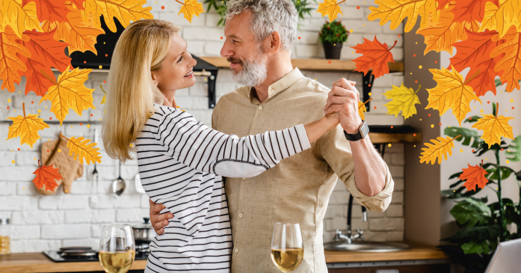 man and woman dancing in kitchen on thanksgiving