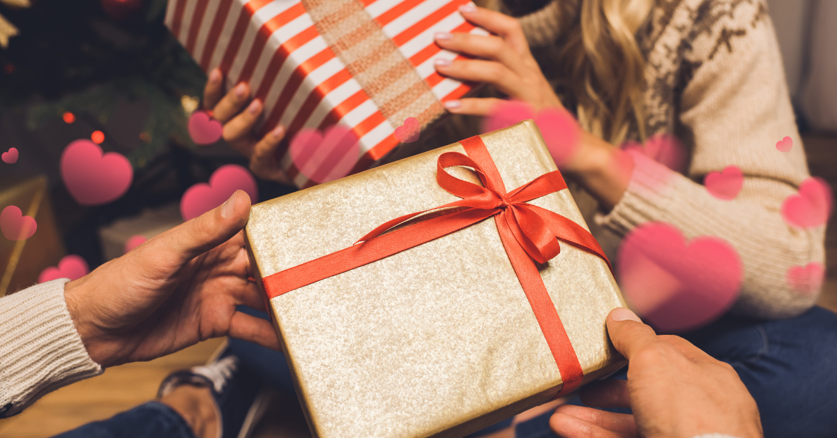 couple exchanging holiday gifts